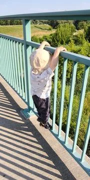 Little explorer on the bridge 스톡 사진