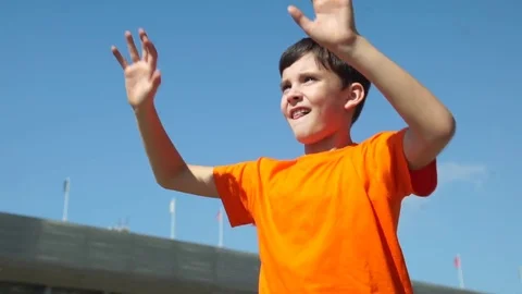 The Little Football Goalkeeper Catches A Ball And Throws Back Stock Footage