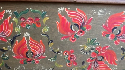 Little girl appears into a vintage chest. Cute small girl look out from a Stock Footage