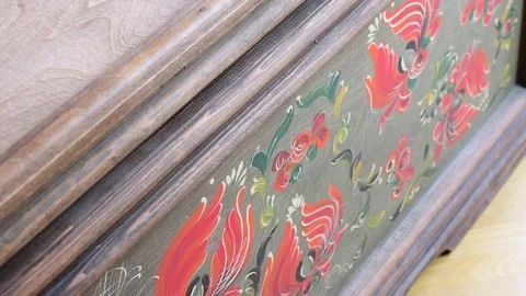 Little girl appears into a vintage chest. Cute small girl opens vintage chest Stock Footage