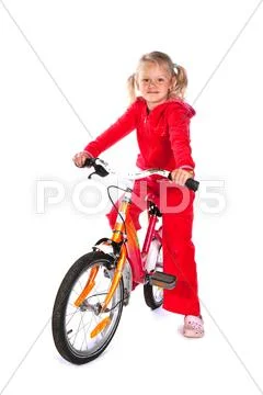 Little girl with bike Stock Photos
