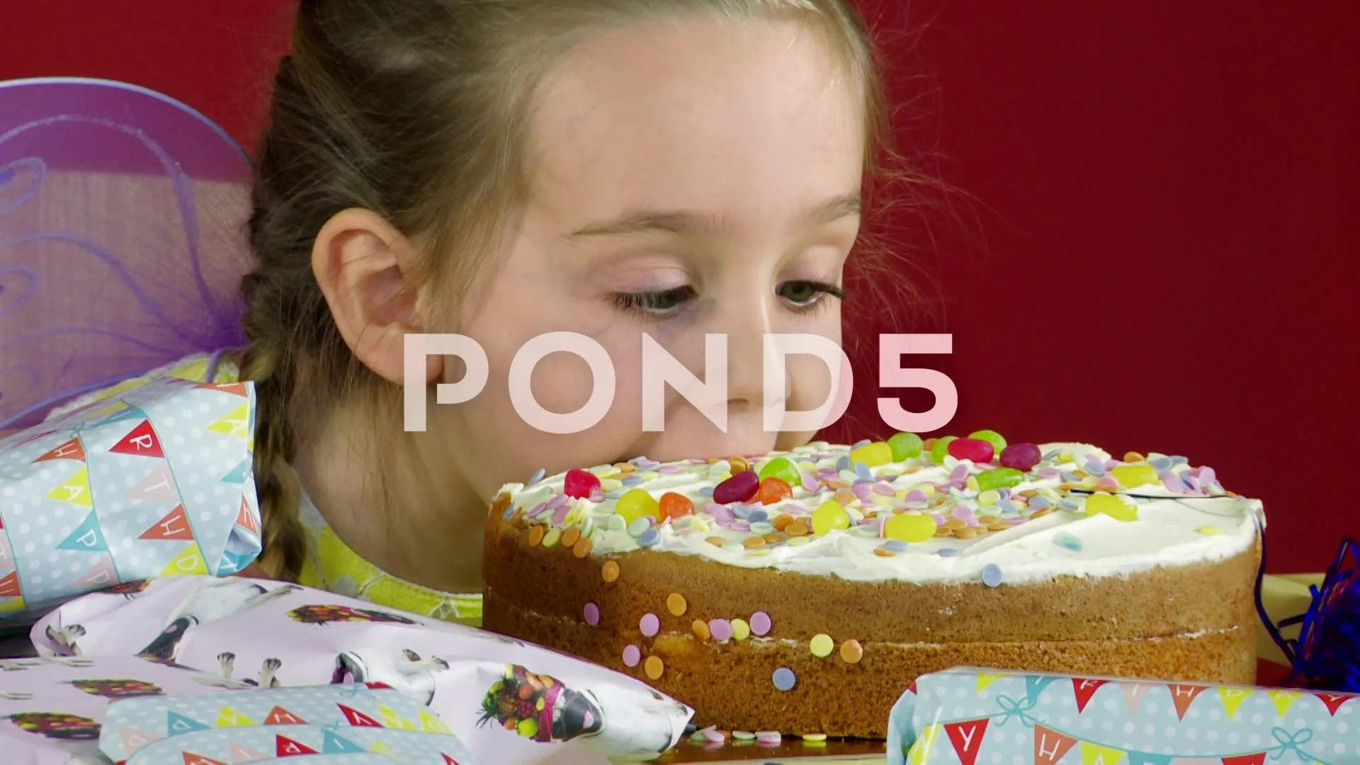 little girl eating cake