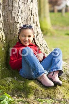 Little girl child having fun in sunshine Stock Photos