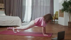 Little Girl Doing Stretching Home Stock Footage Video (100% Royalty-free)  1073641118