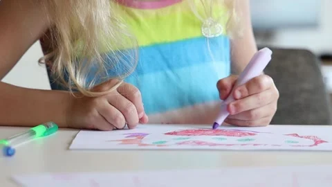 Little girl draws on paper. Stock Footage 252856653