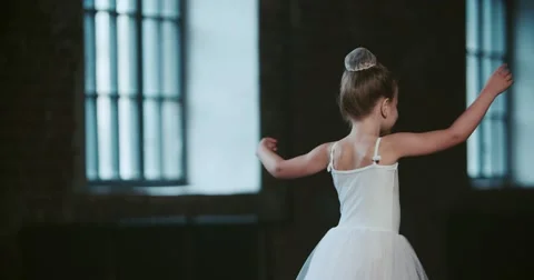 Little girl dreams of becoming a ballerina, and makes no attempt to implement Stock Footage
