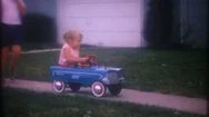 Little Girl Drives A Pedal Car On Sidewalk 1950S Vintage Home Movie 3838 Stock Footage
