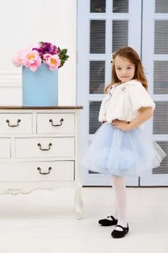 Little girl at her home Stock Photos