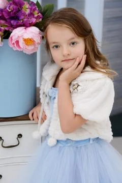 Little girl at her home Stock Photos