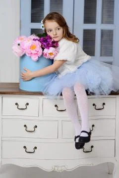 Little girl at her home Stock Photos