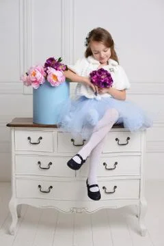 Little girl at her home Stock Photos