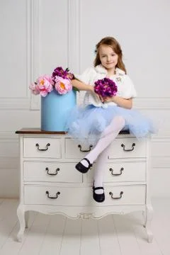 Little girl at her home Stock Photos