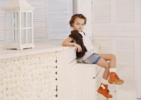 Little girl at her home Stock Photos