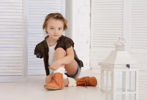 Little girl at her home Stock Photos