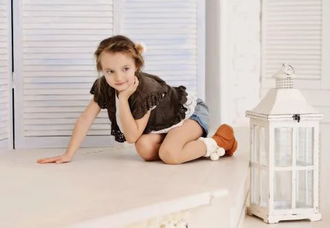 Little girl at her home Stock Photos