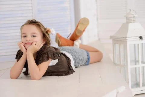 Little girl at her home Stock Photos