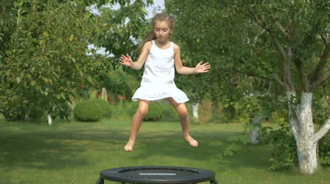 Girl Young Jumping Trampoline Stock Video Footage