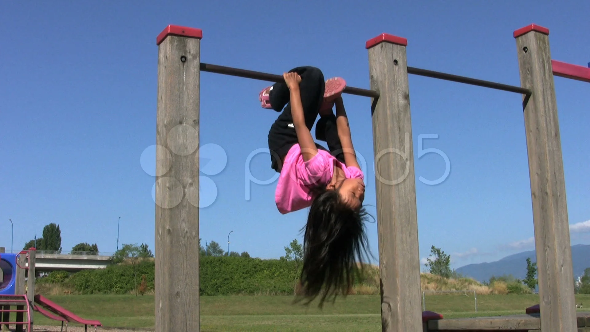 Little Girl On Monkey Bar