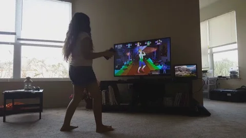 Little girl Playing Dance Video Game Just Dance Stock Footage 74058775