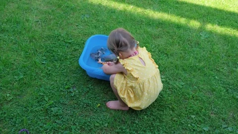 A little girl is playing. Video stock 135190872