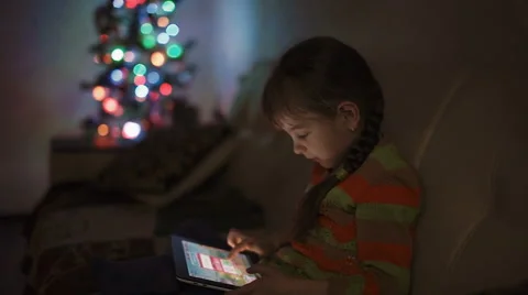 Little Girl Playing Games on Tablet Computer Stock Footage 59509303