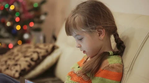 Little Girl Playing Games on Tablet Computer Stock Footage 59509674