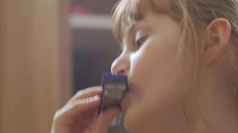 Little Girl Playing The Harmonica Video stock 147935944