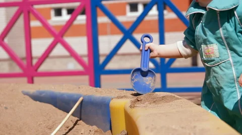 Little girl playing in the sandbox Stock Footage 59127779