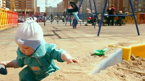 Little girl playing in the sandbox Stock Footage 59128263