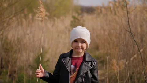 Little girl posing for the camera Stock Footage 129792072