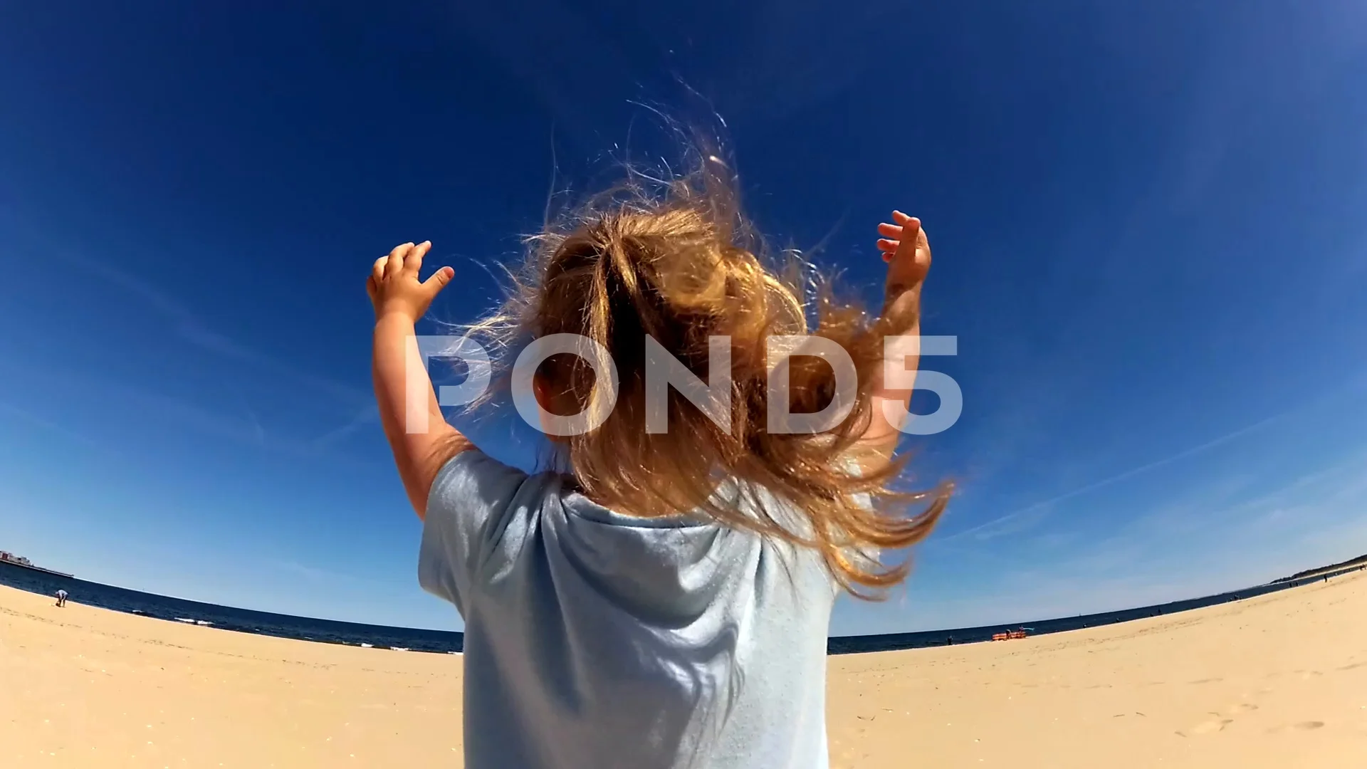 girl reaching up to the sky