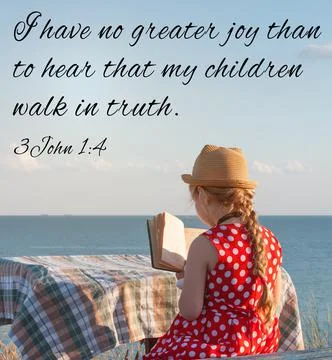 Little girl reading Bible on sea background. Quotes for believers. Inspiratio Stock Photos