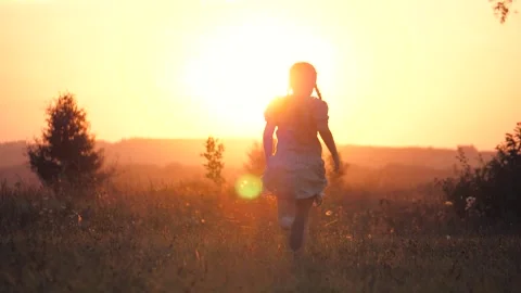 Silhouette of the Running Girl Stock Image - Image of light
