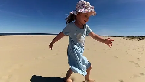 Little Girl Running Smiling Playing On Beach Slow Motion Stock Footage 76455853