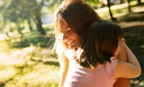 Little girl with special needs enjoy spending time with mother Stock Photos