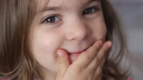 little girl tight lipped | Stock Video