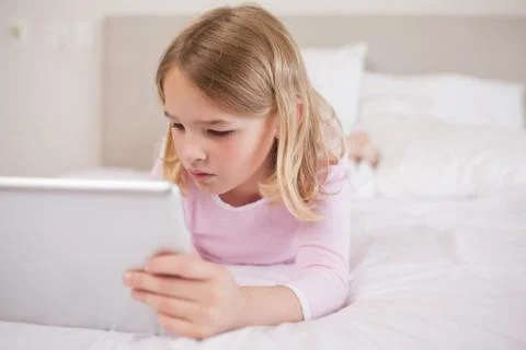 Little girl using a tablet computer 스톡 사진