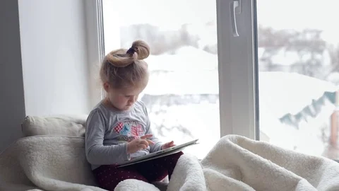 Little girl using tablet pc Stock Footage 69991795