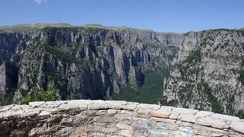 Little girl on the viewpoint Vikos gorge Greece Stock Footage