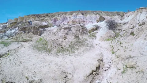 Little girl on a weekend hike with her dad in Paint Mines Interpretive Park. Stock Footage