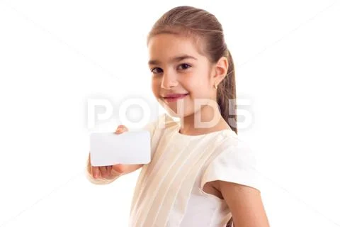 Little girl in white T-shirt holding white card Stock Photos