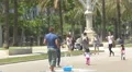 Little girls chasing the soap bubbles in the park in Barcelona 4k or 4k+ Resolution