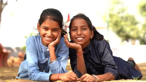 Little girls laughing, lying on his stom... | Stock Video | Pond5