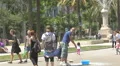 Little girls playing with soap bubbles in the park, Barcelona 4k or 4k+ Resolution