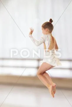 Little gymnast jumping Stock Photos