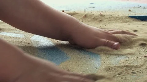 Little hands playing with the sand 2 Stock Footage 79927120