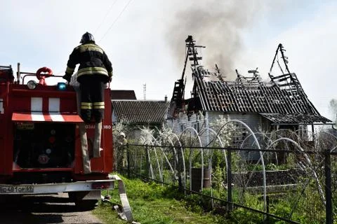 Little house is on fire . short circuit fire. Fire truck Foto stock