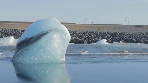 Little Iceberg floating into the river close up Stock Footage 88825570