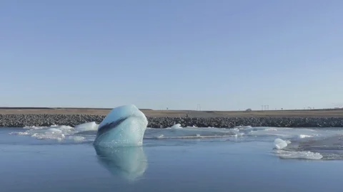 Little Iceberg floating into the river Stock Footage 88827278