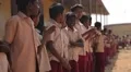 Little Indian boys applauding and smiling in the school yard in India HD Footage